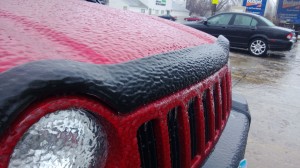 freezing rain red car
